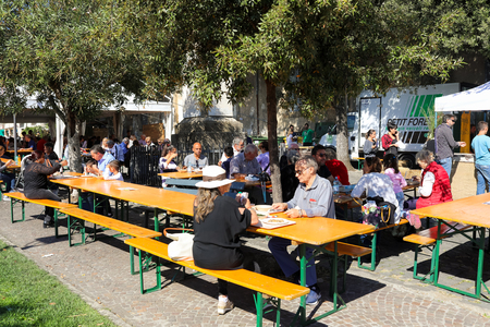 MANZIANA, LAZIO, ITALY - OCTOBER 14, 2017: People celebrating in outdoors one of the most popular and awaited local events, the festival of the local chestnut.のeditorial素材