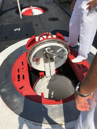 External hatch door on submarine deck.