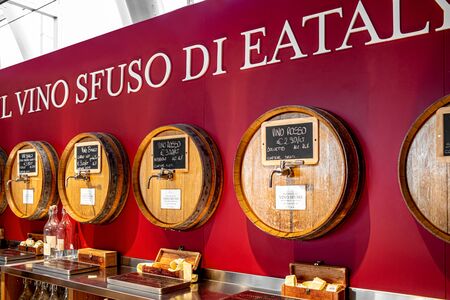 ROME, ITALY - FEBRUARY 17, 2019: A selection of bulk wines at wholesale prices, available in one or three-liter bottles at the wine shop of Eataly, one of the most famous Italian food halls.のeditorial素材