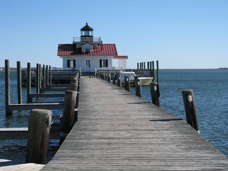 Small inland lighthouse with dockの写真素材