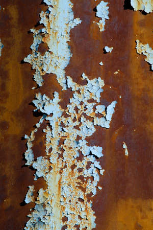 Closeup of rust on a large metal pole