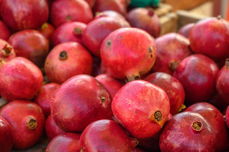 fresh juicy pomegranates at the bazaar on the island of Cyprus in autumn 1の写真素材