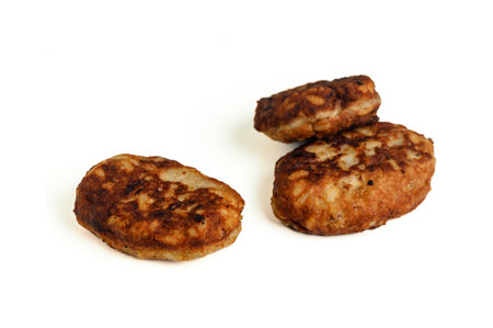 Appetizing fresh Fish cutlets on a white backgroundの写真素材