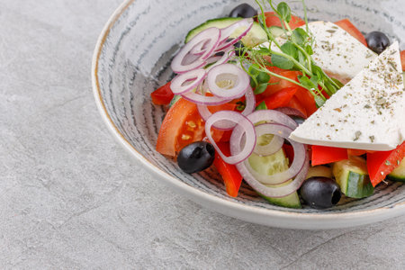 Greek salad on a stone background studio food photo 8の写真素材