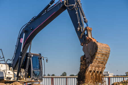 Close up details of industrial excavator working on construction site 1の写真素材