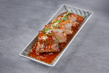 appetizing portion of kebab in a plate on a stone background for the siteの写真素材