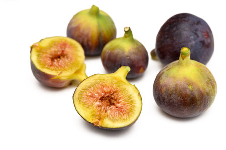 Fresh figs isolated on white background with clipping path, whole and half fruits collection 3の写真素材