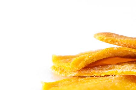 Pile of dried mango slices cut out on transparent background 1の写真素材