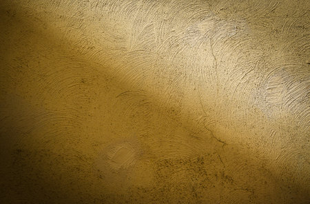 Cement wall painted yellow texture and background seamlessの写真素材