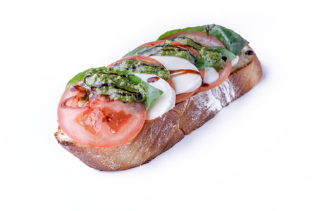 Fresh homemade crispy Italian appetizer called Bruschetta topped with tomato, garlic and basil 2