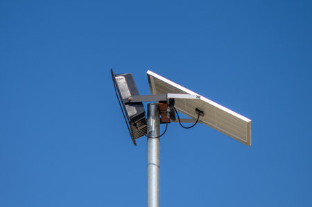 solar-powered street lighting floodlight against the sky