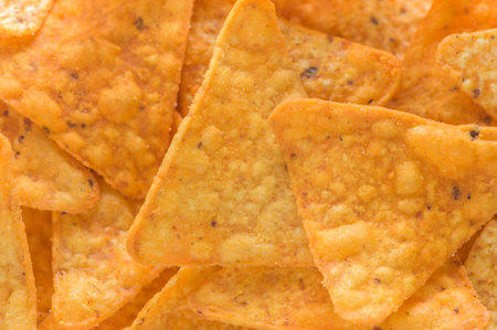 Close-up view of salted tortilla chips, ideal for banner format.