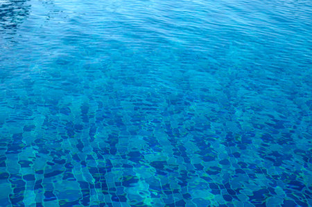 Water waves in sunlight with copy space.
