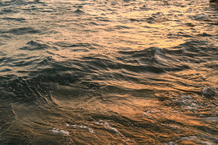 Summer background, nature of tropical golden beach with rays of sun light.