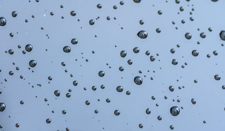 Raindrops on the surface of the car glass. Raindrops natural abstract background. 5