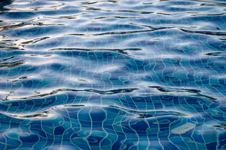 Pool water surface wave texture backgroundの写真素材