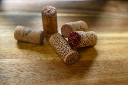 old wine corks on wooden backgroundの写真素材