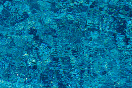 Beautiful sun reflections of water in the pool. Summer. Flight holidays. Blue water.4