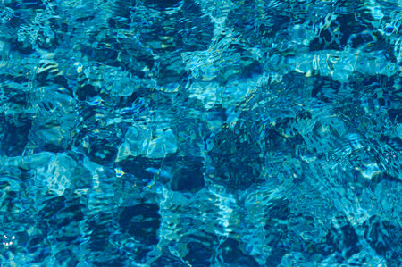 Blue water in swimming pool Summer vacationの写真素材
