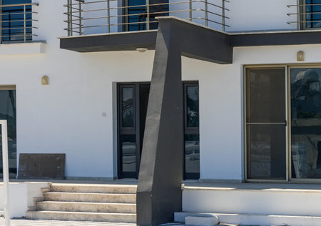 entrance of white new built one-family houseの写真素材