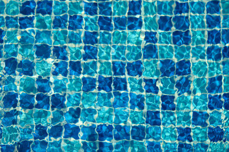 A blue pool shines on a summer day 1の写真素材