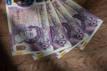 20 pound sterling bank notes closeup view business backgroundの写真素材