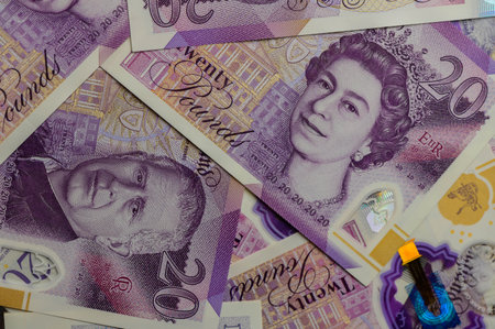 20 pound sterling bank notes closeup view business background 1の写真素材