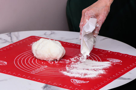 Close Up Asian Female Hand Rounding Raw Bread Dough, Baking Process Making Japanese Fluffy White...