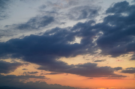 Background of colorful sky concept: Dramatic sunset with twilight color sky and clouds