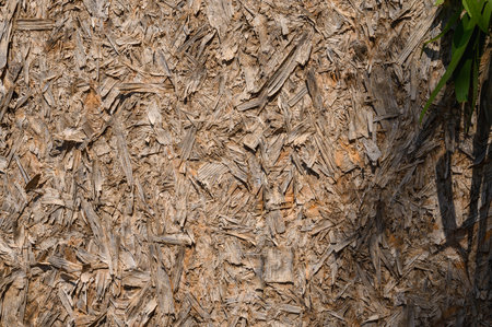 OSB board texture. Building panels from wooden chips. Simple pressed chipboard pattern. Wood texture