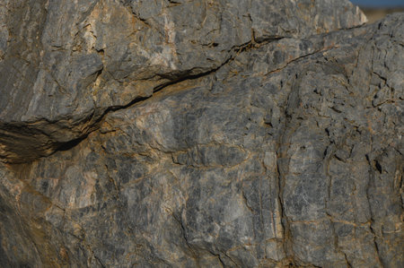 A stunning view of a weathered rock formation shining in sunlight.の写真素材