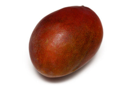 A vibrant tropical fruit featuring reddish-brown skin, inviting culinary curiosity and healthy eating opportunities.の写真素材