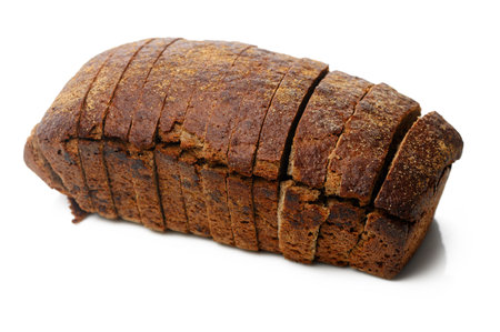 A warm loaf of freshly baked bread, perfectly sliced, inviting everyone to enjoy its delightful...