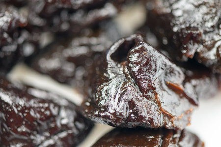 Sweet and chewy dried plums ready for culinary delights and snacking moments