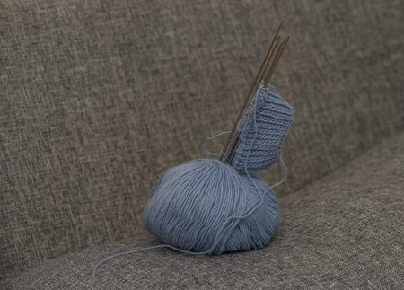 Knitting Composition with Yarn Ball, Needles and Sock Startの写真素材