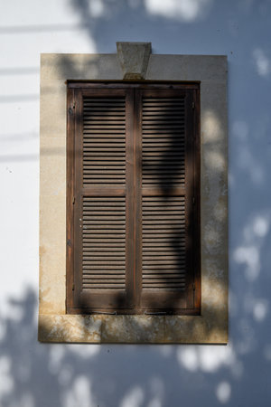 Traditional Window with Wooden Shutters in Cyprus
