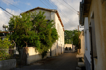 Quaint Cypriot street in Lefke with stone houses and balconies, showcasing local architecture and charm.の写真素材
