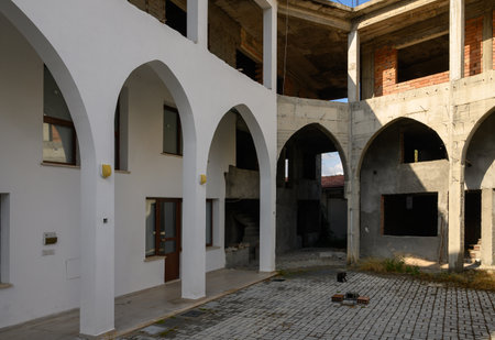 Traditional white Mediterranean-style house with elegant arches and classic architectural details, located in Cyprus.の写真素材