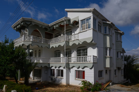 Traditional Cypriot Stone House with Green Shutters in Lefkeの写真素材