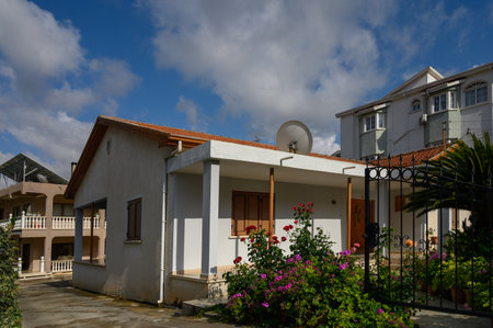 Traditional Stone House with Green Shutters in Lefke Cyprusの写真素材