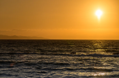 Sunset Over the Mediterranean Sea Coast in Cyprusの写真素材