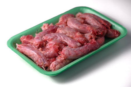 Pack of Fresh Chicken Necks Isolated on White Backgroundの写真素材