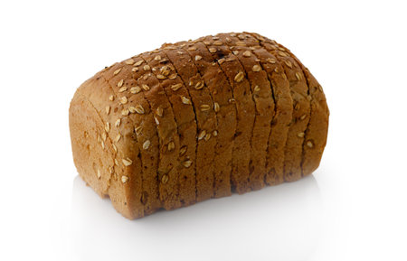 Fresh whole grain sliced toast bread isolated on clean white background with soft shadow. Nutritious...