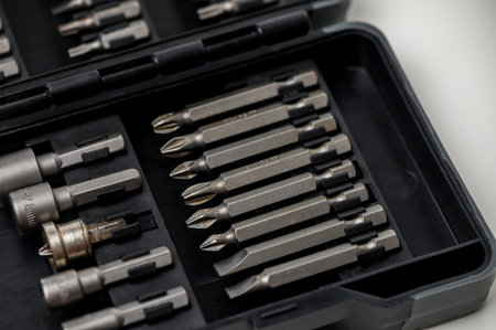 Close-up of a screwdriver set with various sizes and types, isolated on white background, ideal for...