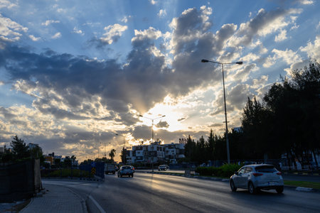 Street in Cyprus during autumn sunset. Warm light, Mediterranean atmosphere and urban scenery.の写真素材