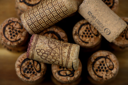 Wine and champagne corks symbolizing celebration and joy. Perfect festive background with rustic and elegant mood.の写真素材