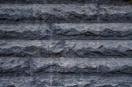 Decorative stone wall close-up with interesting texture and stone pattern. Perfect as a background...
