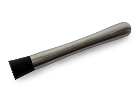 High-resolution studio photograph of a stainless steel bar muddler (cocktail pestle) used for...