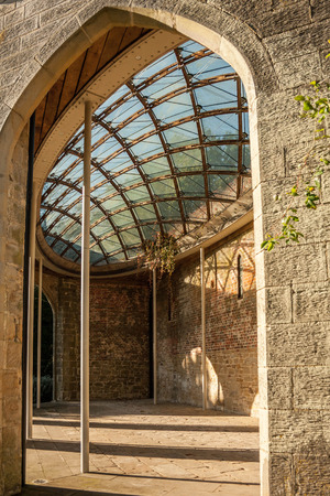 The interior of a stone brick building with a patterned glass ceiling.のeditorial素材