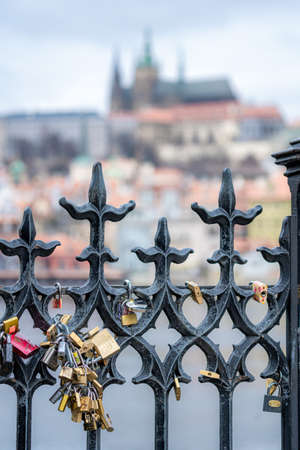 Selective Focus Of Romantic Padlocks On Charles Bridge, Prague, Portrait Orientation